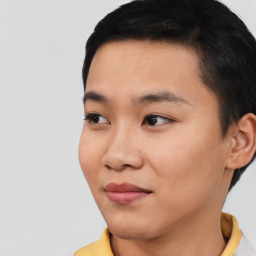 Joyful asian young-adult female with short  black hair and brown eyes