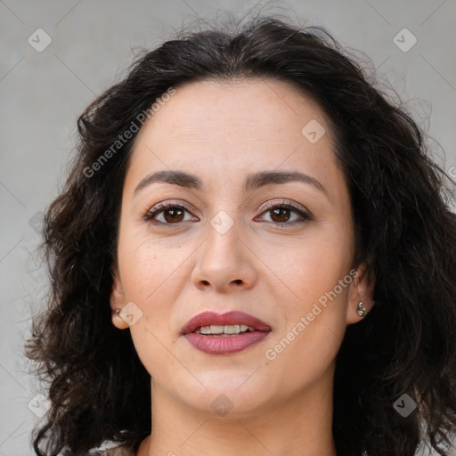 Joyful white adult female with long  brown hair and brown eyes