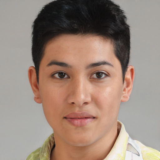 Joyful asian young-adult male with short  black hair and brown eyes