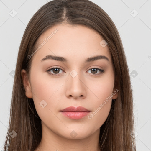 Neutral white young-adult female with long  brown hair and brown eyes