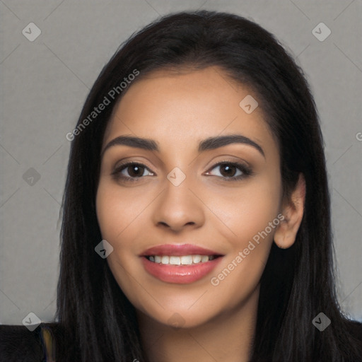 Joyful latino young-adult female with long  black hair and brown eyes