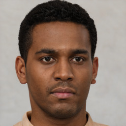 Neutral black young-adult male with short  brown hair and brown eyes