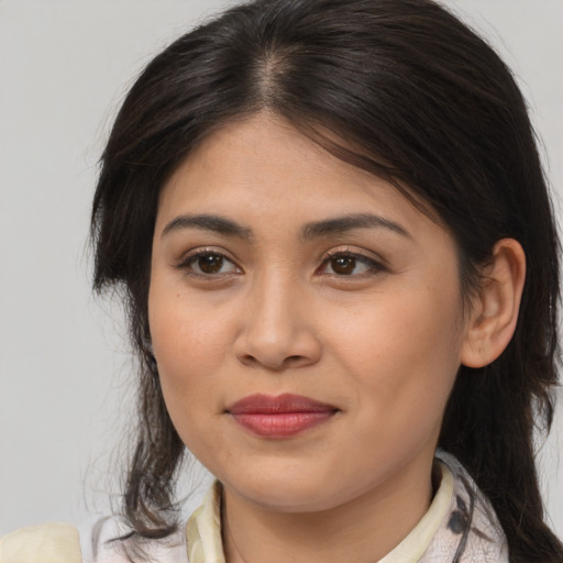 Joyful asian young-adult female with medium  brown hair and brown eyes