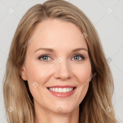 Joyful white young-adult female with long  brown hair and green eyes