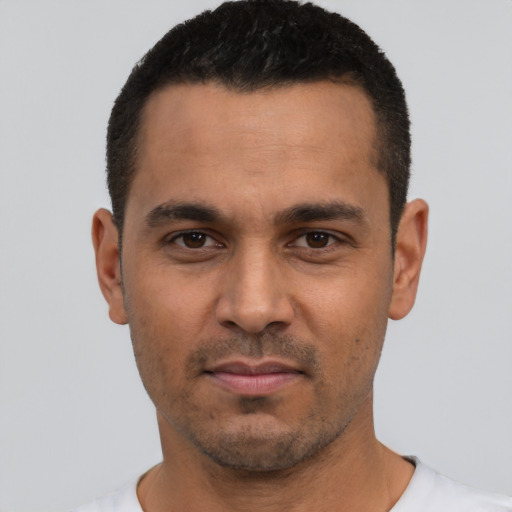 Neutral white young-adult male with short  black hair and brown eyes