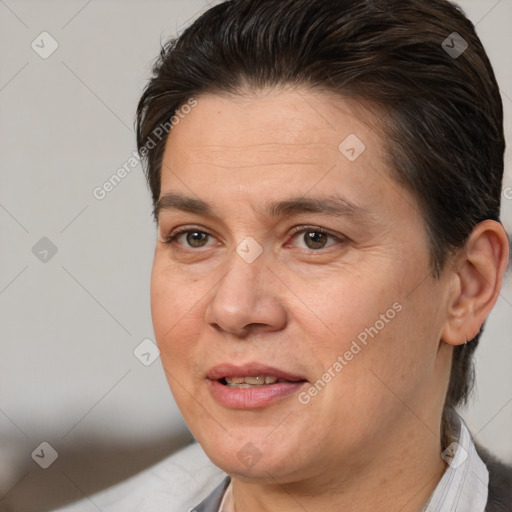 Joyful white adult female with short  brown hair and brown eyes