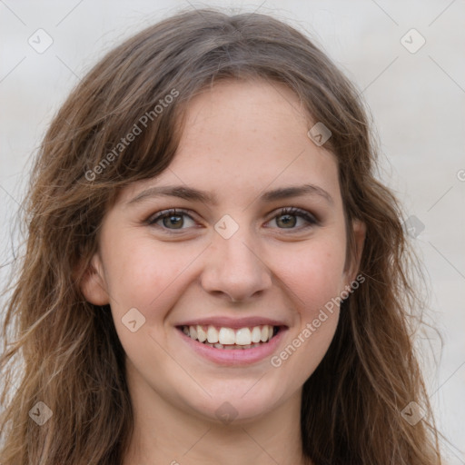 Joyful white young-adult female with long  brown hair and green eyes