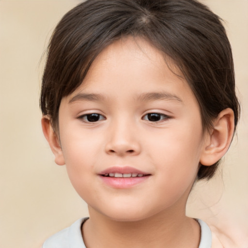 Joyful white child female with medium  brown hair and brown eyes