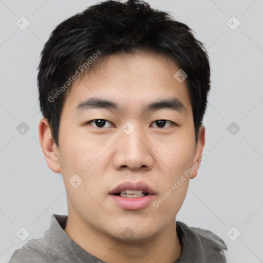 Neutral asian young-adult male with short  black hair and brown eyes