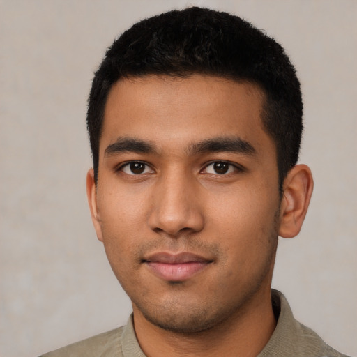 Neutral latino young-adult male with short  black hair and brown eyes