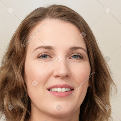 Joyful white young-adult female with long  brown hair and green eyes