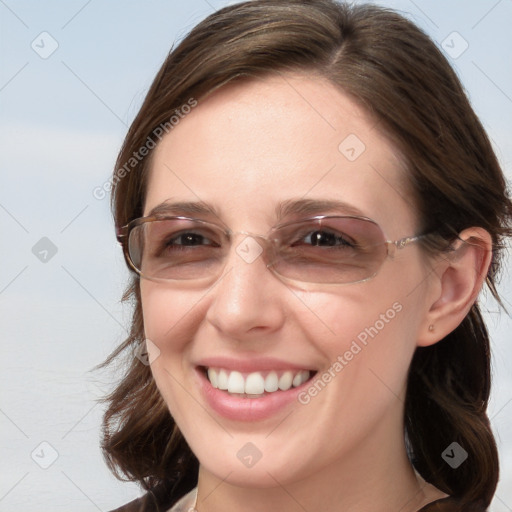 Joyful white young-adult female with medium  brown hair and blue eyes