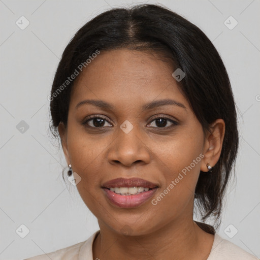 Joyful black young-adult female with medium  brown hair and brown eyes