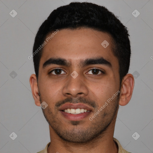 Joyful latino young-adult male with short  black hair and brown eyes