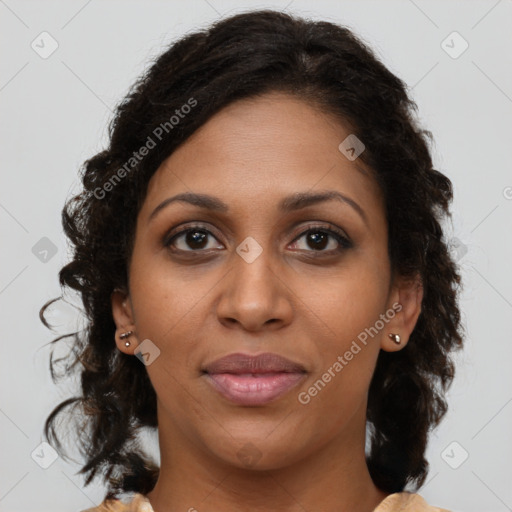 Joyful black young-adult female with medium  brown hair and brown eyes