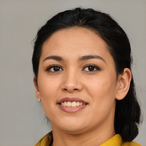 Joyful asian young-adult female with medium  black hair and brown eyes