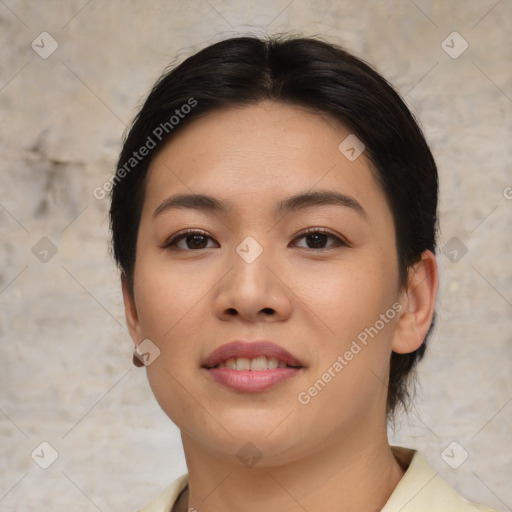 Joyful asian young-adult female with medium  brown hair and brown eyes