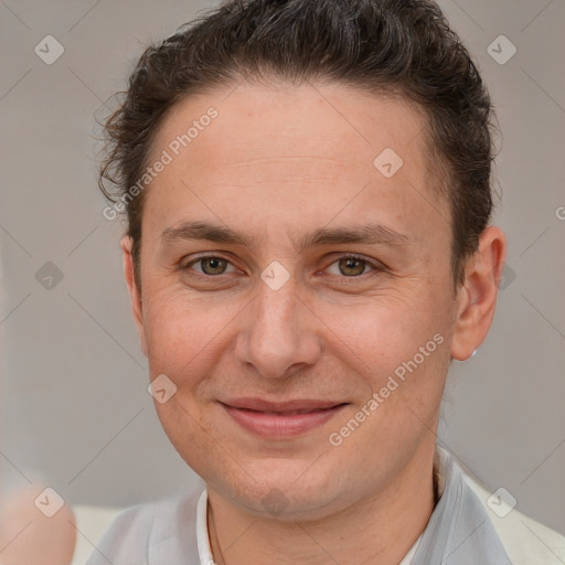 Joyful white adult female with short  brown hair and brown eyes