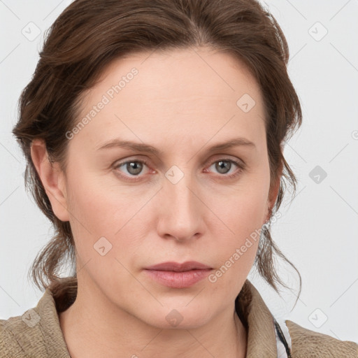 Neutral white young-adult female with medium  brown hair and grey eyes