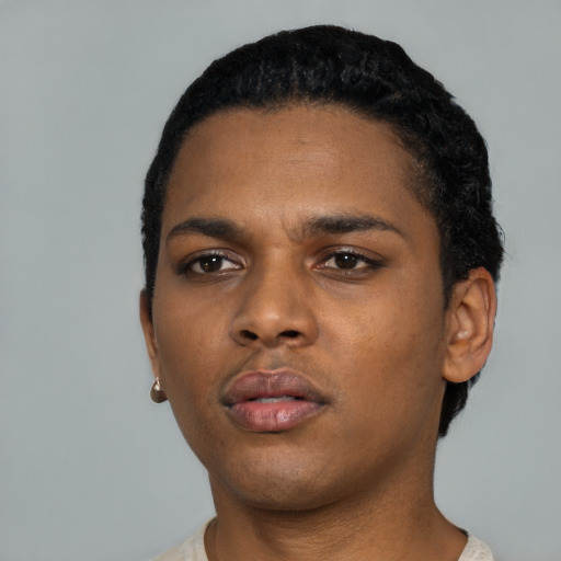 Neutral black young-adult female with short  black hair and brown eyes