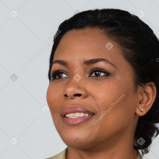 Joyful latino young-adult female with medium  black hair and brown eyes