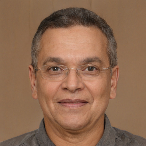 Joyful white middle-aged male with short  brown hair and brown eyes