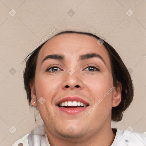 Joyful white young-adult female with short  brown hair and brown eyes