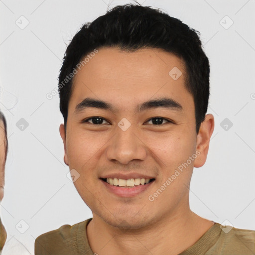 Joyful latino young-adult male with short  black hair and brown eyes