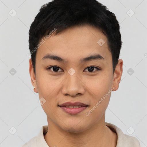 Joyful asian young-adult male with short  black hair and brown eyes