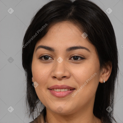 Joyful asian young-adult female with medium  brown hair and brown eyes