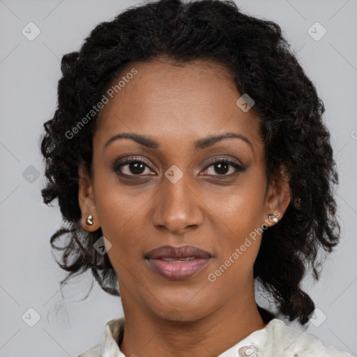 Joyful black young-adult female with medium  brown hair and brown eyes