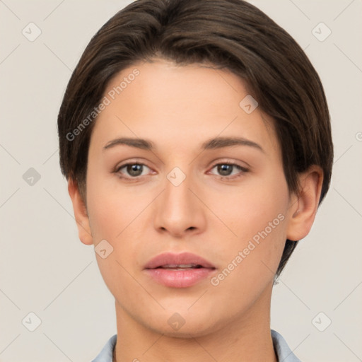 Neutral white young-adult female with short  brown hair and brown eyes