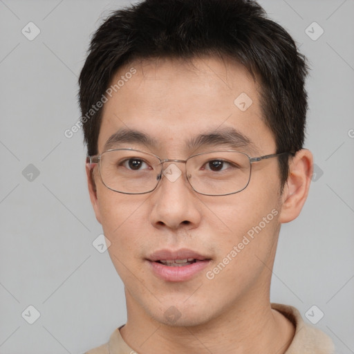 Neutral asian young-adult male with short  brown hair and brown eyes