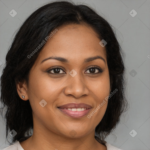 Joyful black young-adult female with medium  brown hair and brown eyes