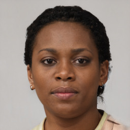 Neutral black young-adult female with short  brown hair and brown eyes