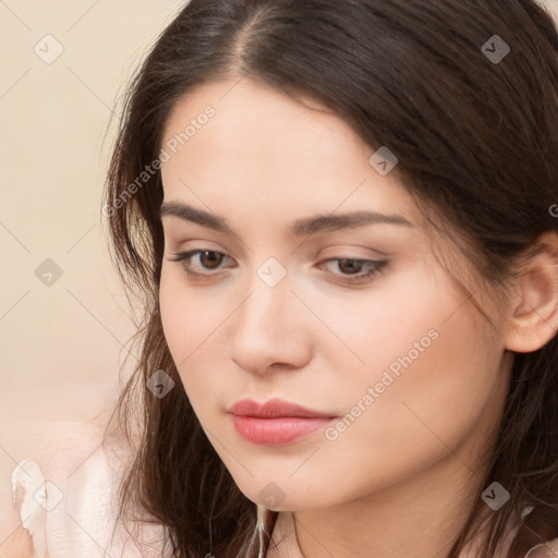 Neutral white young-adult female with long  brown hair and brown eyes