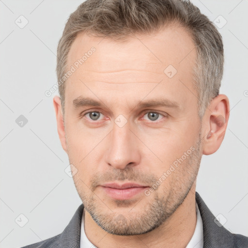 Neutral white adult male with short  brown hair and brown eyes