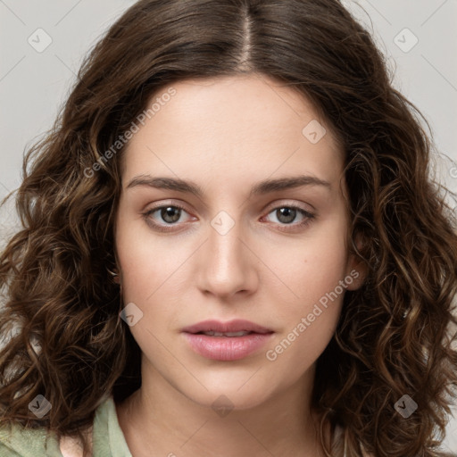 Neutral white young-adult female with long  brown hair and brown eyes