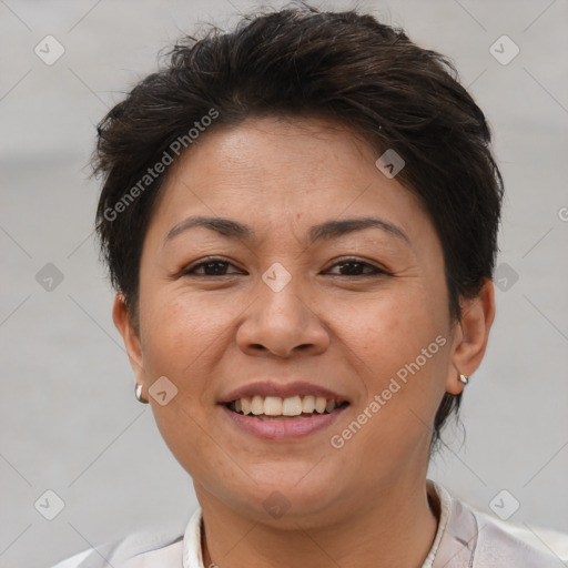 Joyful white adult female with short  brown hair and brown eyes