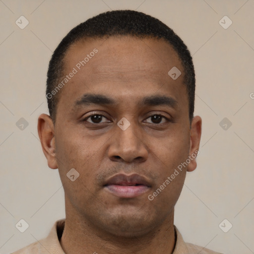 Neutral latino young-adult male with short  black hair and brown eyes