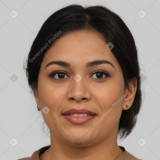 Joyful latino young-adult female with medium  brown hair and brown eyes