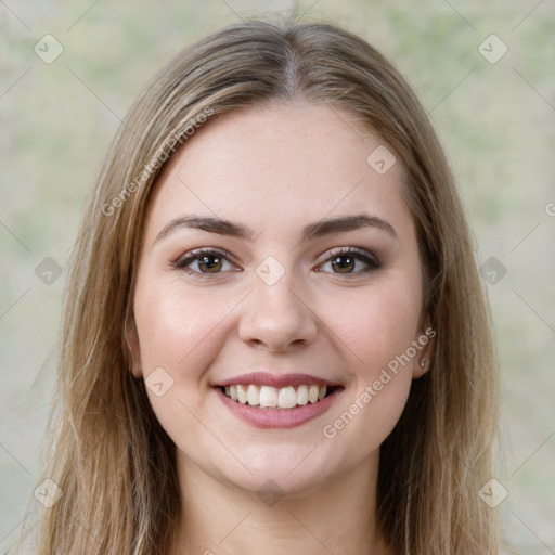 Joyful white young-adult female with long  brown hair and green eyes