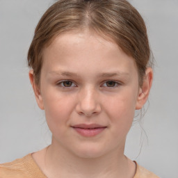 Joyful white child female with medium  brown hair and brown eyes