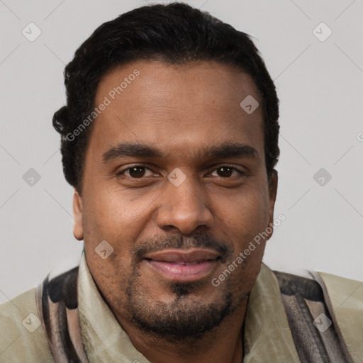 Joyful black adult male with short  brown hair and brown eyes