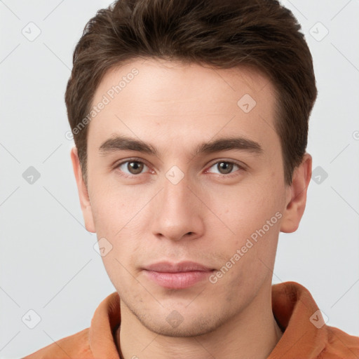 Neutral white young-adult male with short  brown hair and brown eyes