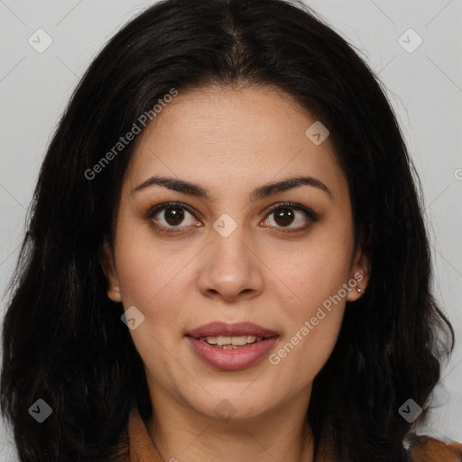 Joyful latino young-adult female with long  brown hair and brown eyes