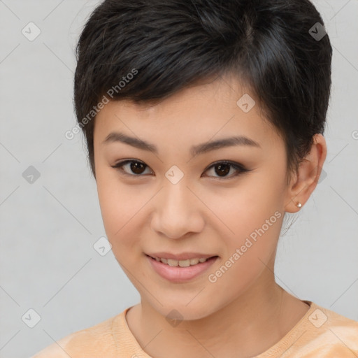 Joyful asian young-adult female with short  brown hair and brown eyes