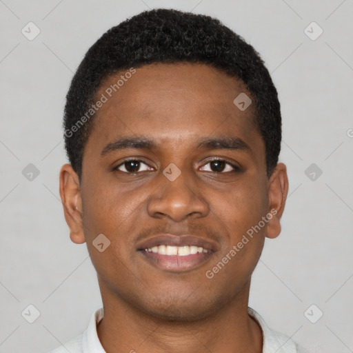 Joyful latino young-adult male with short  brown hair and brown eyes