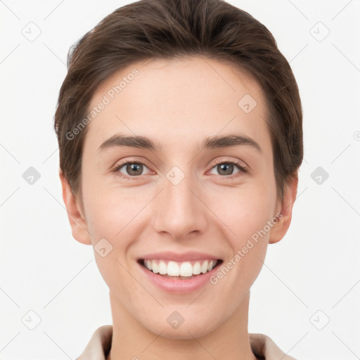 Joyful white young-adult female with short  brown hair and grey eyes