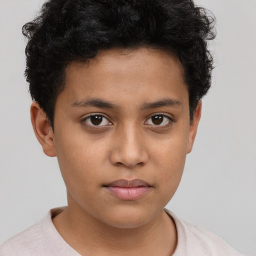Neutral latino child male with short  brown hair and brown eyes